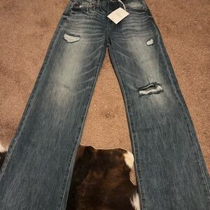 Distressed Blue Jeans
